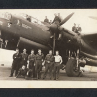 Aircrew and ground personnel with a Lancaster