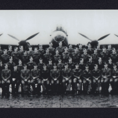 Group of airmen in front of a Lancaster