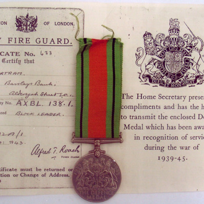 City fire guard certificate and Defence Medal