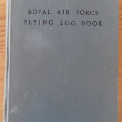 Norman Wilkins - flying log book cover