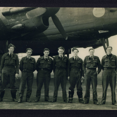 Seven aircrew beneath a Lancaster