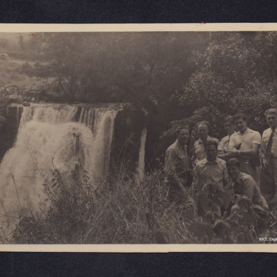 Group of men by Chania falls