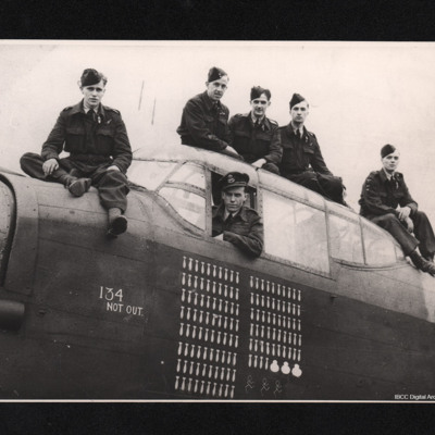 Six airmen on a Lancaster