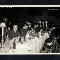 Airmen seated at formal dinner