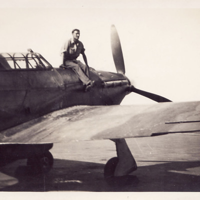 Airman sitting on a Hurricane