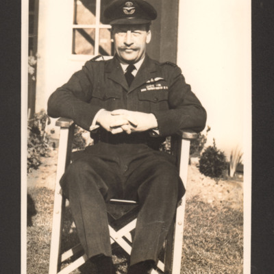 Squadron Leader sitting in chair