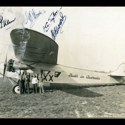 Four men under wing of an Avro Ten