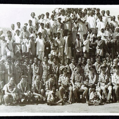 Large group of airman and civilian workers
