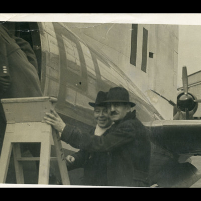 Roy Chadwick and Bill Thorn at rear cabin door of an aircraft
