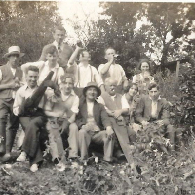 Group of men and women in a garden