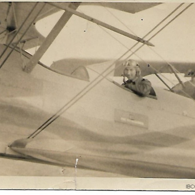 Airman in cockpit of a Stearman