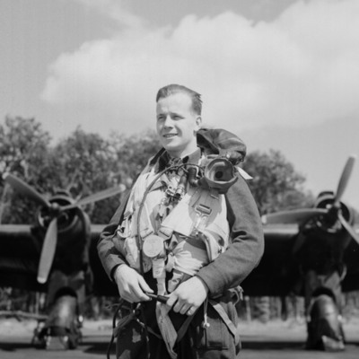 Airman in Mae West and parachute harness