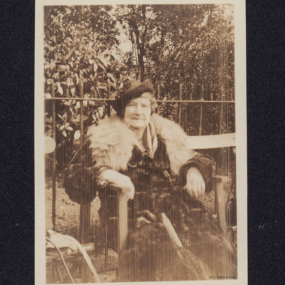 Woman Seated on a Park Bench