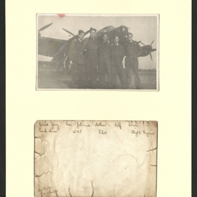 Five airmen in front of Lancaster