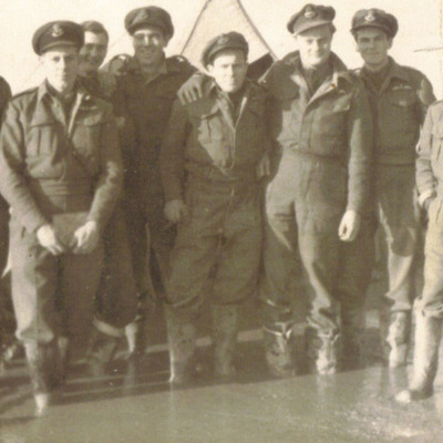 Eight Airmen in Mud