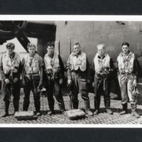 Six aircrew in front of a B-24