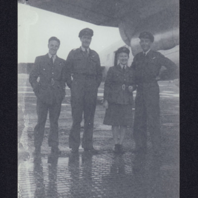 Flight Officer Anne Imming and Three Airmen
