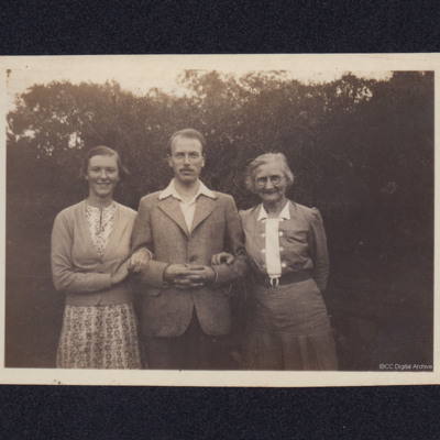 A man and two women