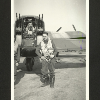 Airman in front of rear gunner position