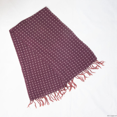 Burgundy scarf with red tassels