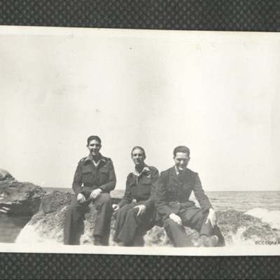Three airmen at the coast