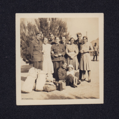 Group of airmen with hostesses