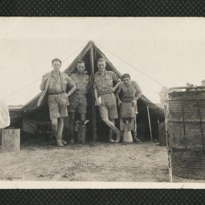 Four airmen and tent