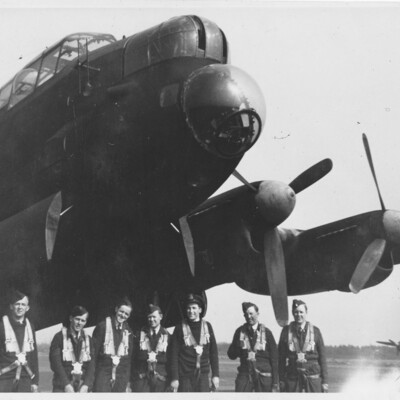 Airmen by a Lancaster