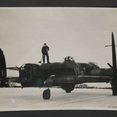 Clearing snow off a Lancaster