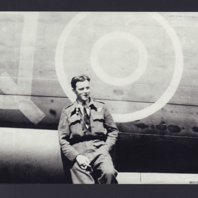 Airman leaning against a Lancaster