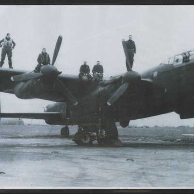 Seven Airmen on a Lancaster