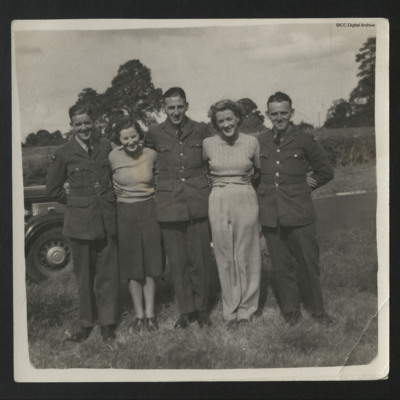 Three Airmen and Two Women