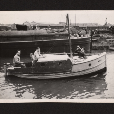 Two men and two boys on a boat on Fossdyke navigation
