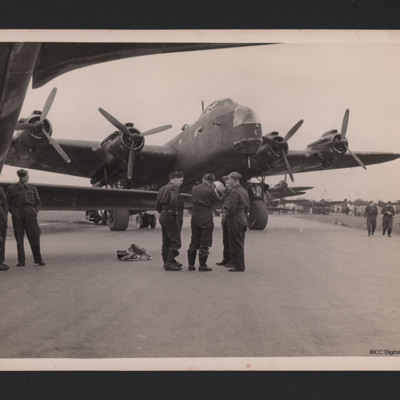 Groups of airmen in front of a Stirling