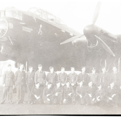 Air and ground crew in front of a Lancaster