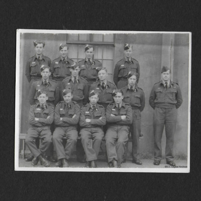 Twelve trainee airmen and instructor