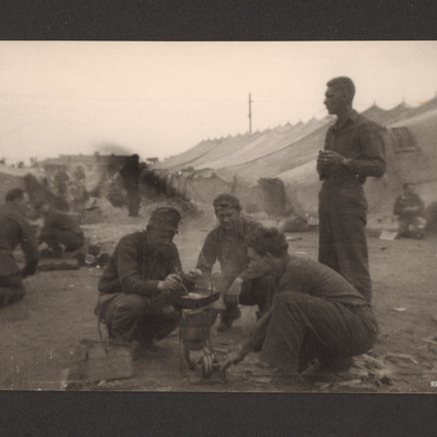 Men cooking in prisoner of war camp