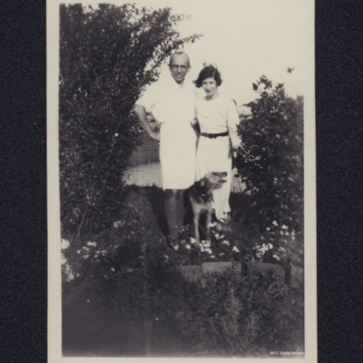 Man and woman standing in garden