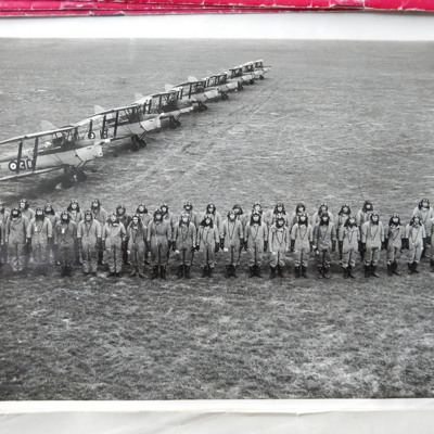 Group of Trainee Pilots and Line of eight Tiger Moths
