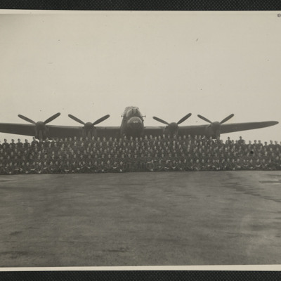 Squadron personnel and Lancaster