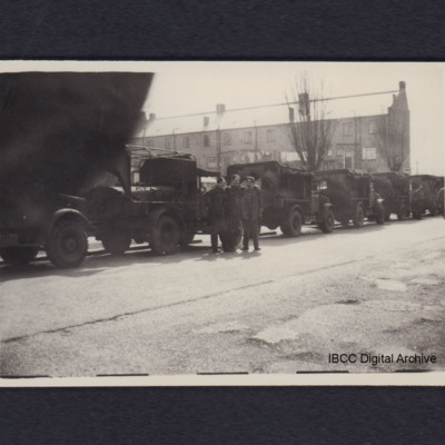 Convoy of lorries and three airmen
