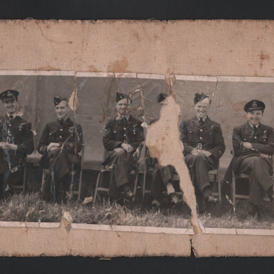 Seven seated airmen
