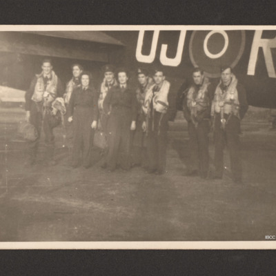Seven aircrew and two members of the Women&#039;s Auxiliary Air Force in front of a 149 Squadron Lancaster