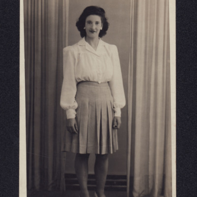 Woman in skirt and blouse