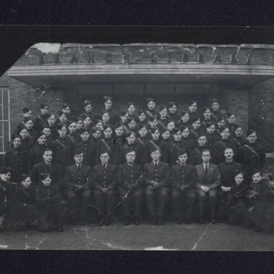 Group of ATC cadets and officers in a doorway to library